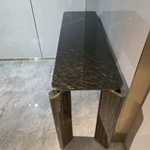 Dark Marble Console Table with Checkered Wood Legs and Polished Metal Frame